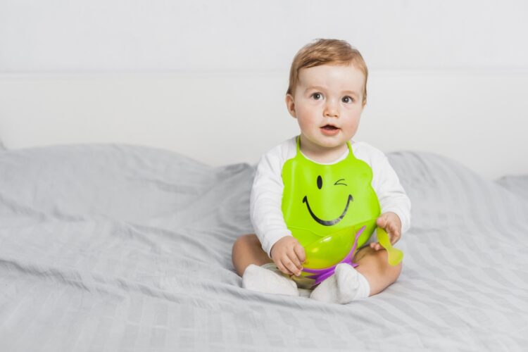 Baby Yoga: The Benefits and How to Get Started 58 Optimized sitting baby wearing bib