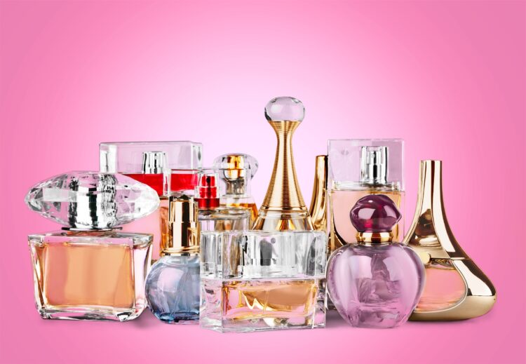 Scented Elegance: A Fragrance Guide for Every Occasion 52 aromatic perfume bottles background