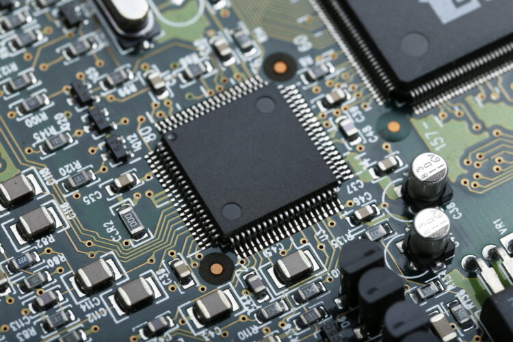 Breaking Ground: Exploring the Latest Innovations in Semiconductor Materials 51 closeup electronic circuit board with cpu microchip electronic components background