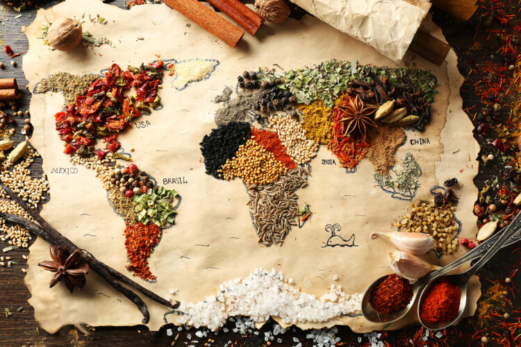 Aromatic Journeys: Unveiling the History of Spices from Ancient Times to the Present Day 51 map world made from different kinds spices wooden background