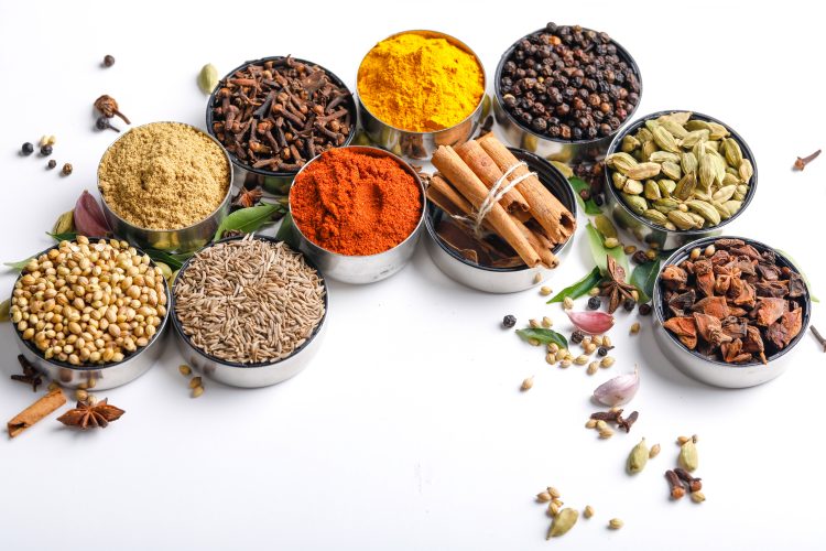 The Role of Spices in Traditional Medicine: Healing and Prevention 51 various spices bowls white
